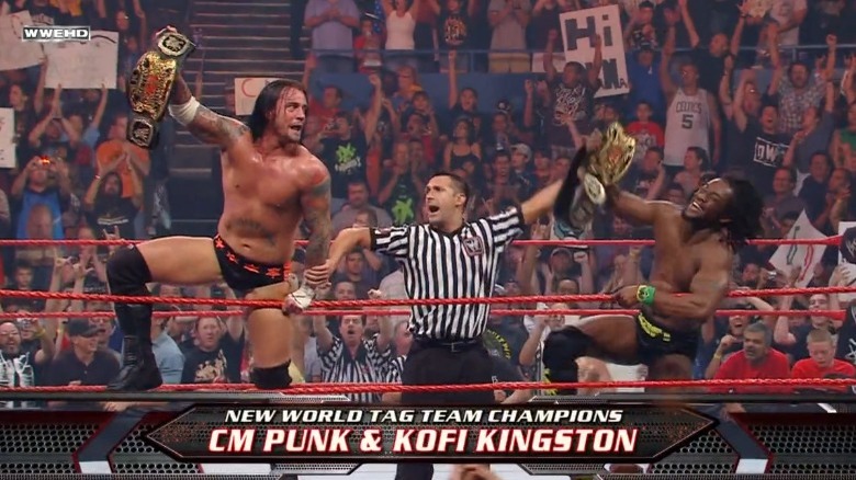 CM Punk Kofi Kingston win tag champions