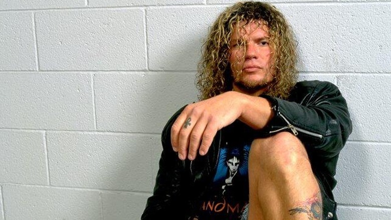 Raven backstage at WCW posing for a photoshoot.