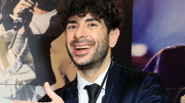 Tony Khan pointing and smiling 