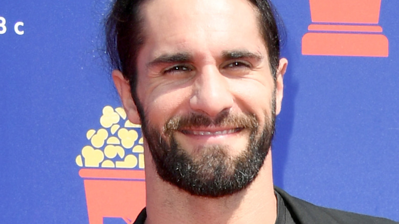 Seth Rollins posing at a promotional event 