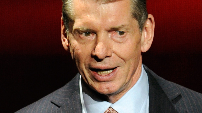 Vince McMahon speaking on stage