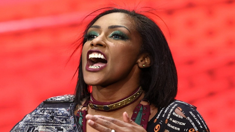 Red Velvet celebrating after defeating Mercedes Mone