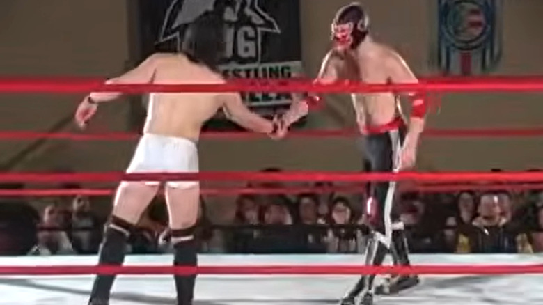 PAC and El Generico shake hands