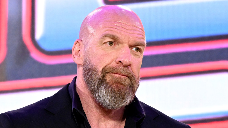 Triple H with a half grin
