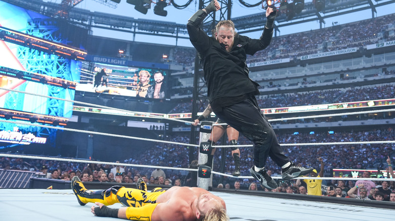Country artist Jelly Roll connects an elbow drop on Logan Paul during their clash at WWE SummerSlam