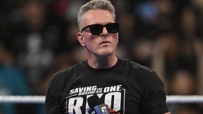 Pat McAfee wearing black sunglasses