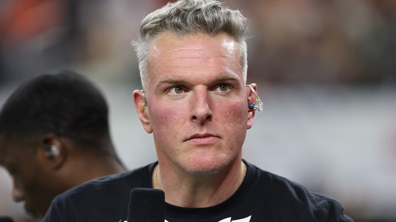 Pat McAfee wearing an ear piece