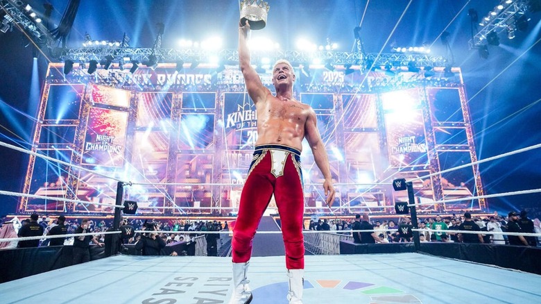 Cody Rhodes holds the King of the Ring crown high after winning the tournament at WWE Night of Champions 2025 in Saudi Arabia.
