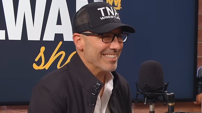 Carlos Silva wearing his TNA hat