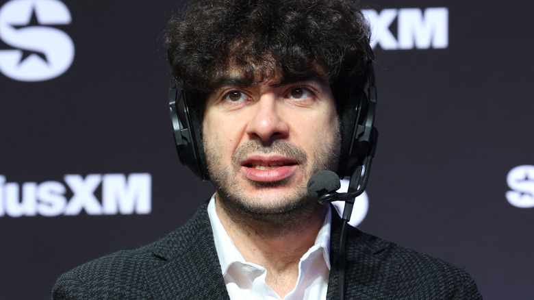 Tony Khan wearing a headset