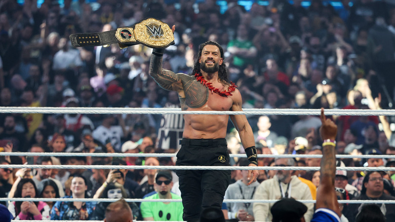 Roman Reigns celebrates after defeating CM Punk to win the World Heavyweight Championship match during WrestleMania 42 at Allegiant Stadium on April 19, 2026 in Las Vegas, Nevada.