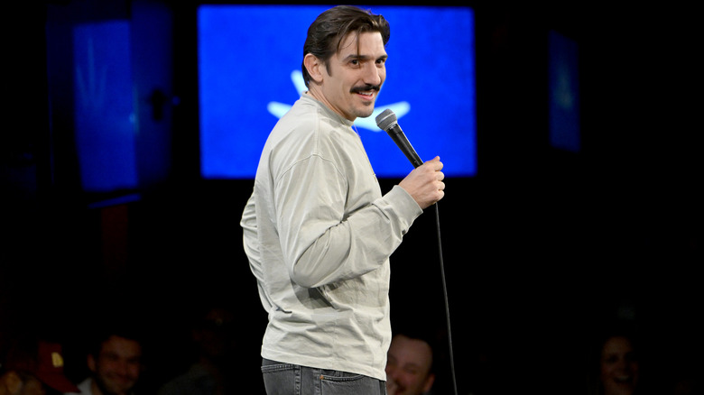 Andrew Schulz doing comedy