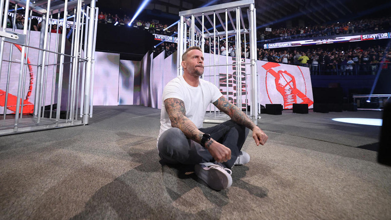 CM Punk seated on entrance