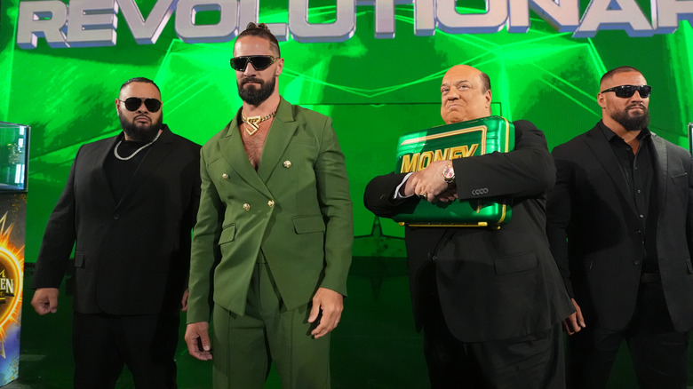 Bronson Reed, Seth Rollins, Paul Heyman, and Bron Breakker