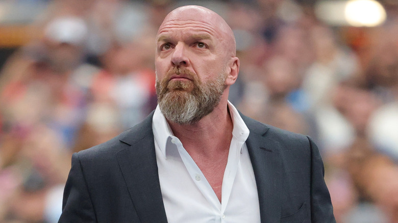 Triple H wearing a black leather jacket