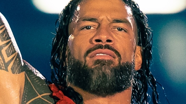 Roman Reigns grimacing