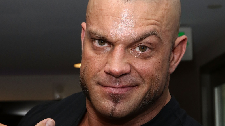 Brian Cage smiling