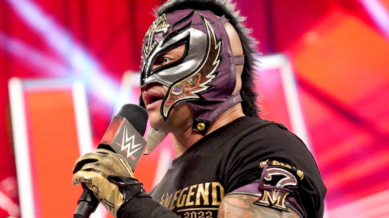 Rey Mysterio talking into a micriphone
