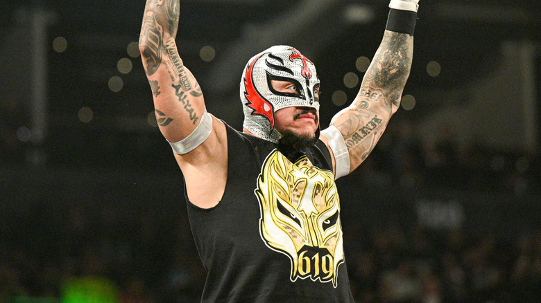 Rey Mysterio raising his arms during WWE Raw