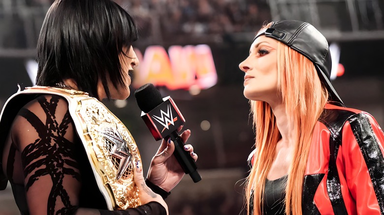 Rhea Ripley talking to Becky Lynch