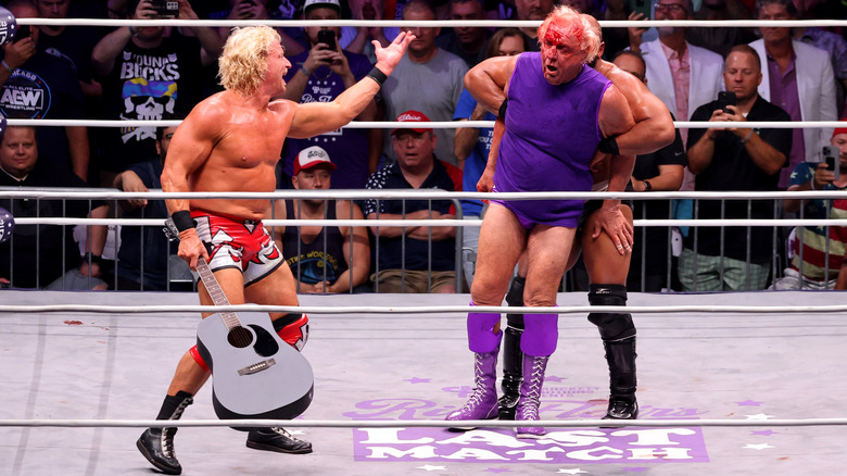 A bloodied Ric Flair wrestles his final match