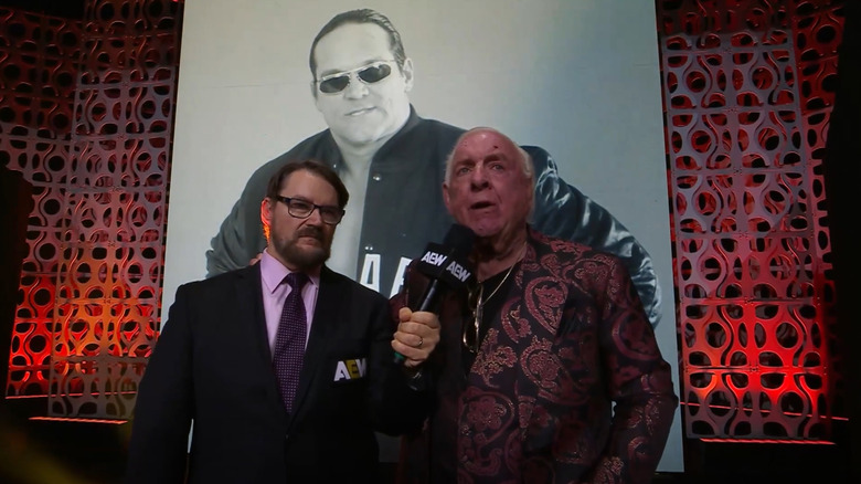 Ric Flair stands alongside Tony Schiavone