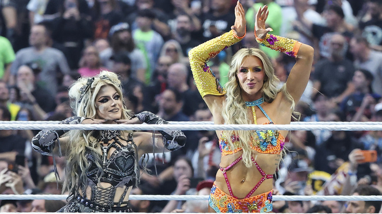 Alexa Bliss and Charlotte Flair before their Women's Tag Team Championship Fatal 4-Way match at WrestleMania 42.