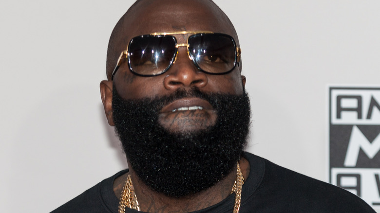 Rick Ross bites lip at American Music Awards