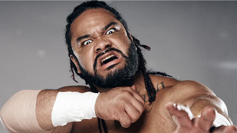 Jacob Fatu reaches forward