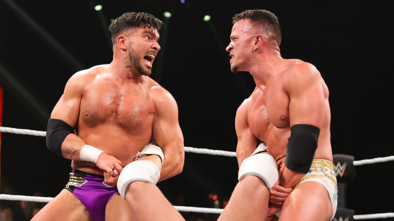 Ethan Page and Ricky Saints staring at each other