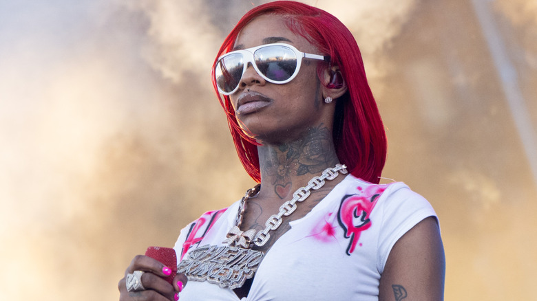 Sexyy Red wearing white sunglasses