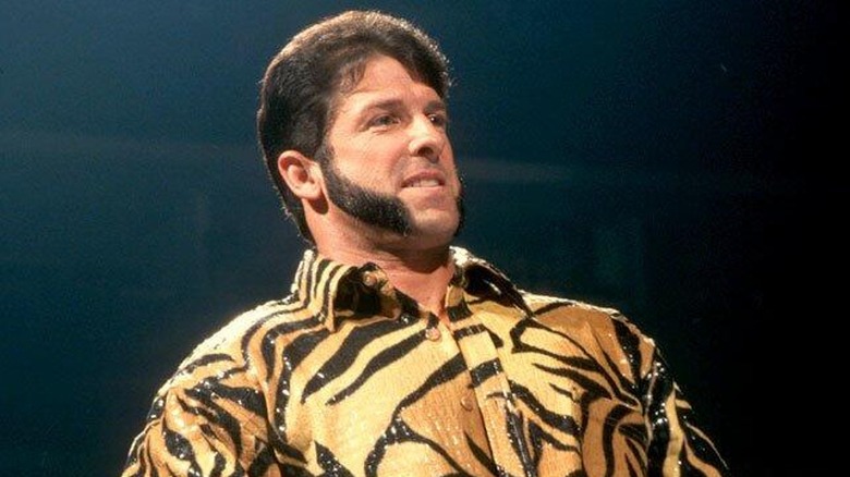 Rico Constantino in ring during a segment with Billy & Chuck.