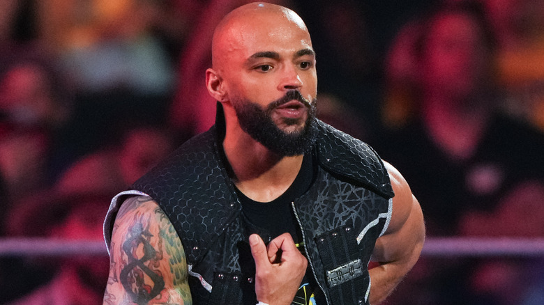Ricochet wearing a sleeveless jacket