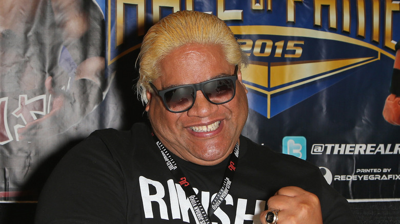 Rikishi posing with a fist