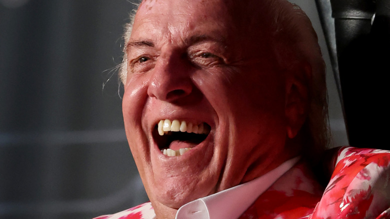 Ric Flair laughs at an event promoting his retirement match