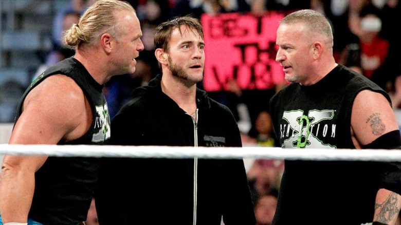 CM Punk And The New Age Outlaws Prepare For A Match