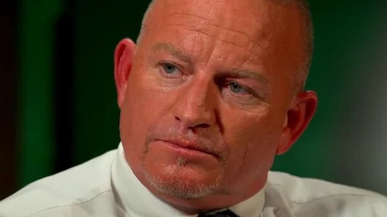 Road Dogg looks away