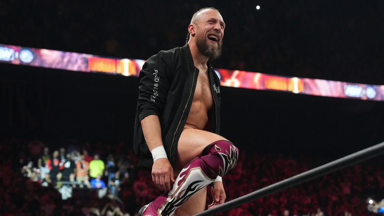 Bryan Danielson smiling on the top turnbuckle