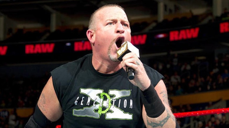 Road Dogg yelling into the mic