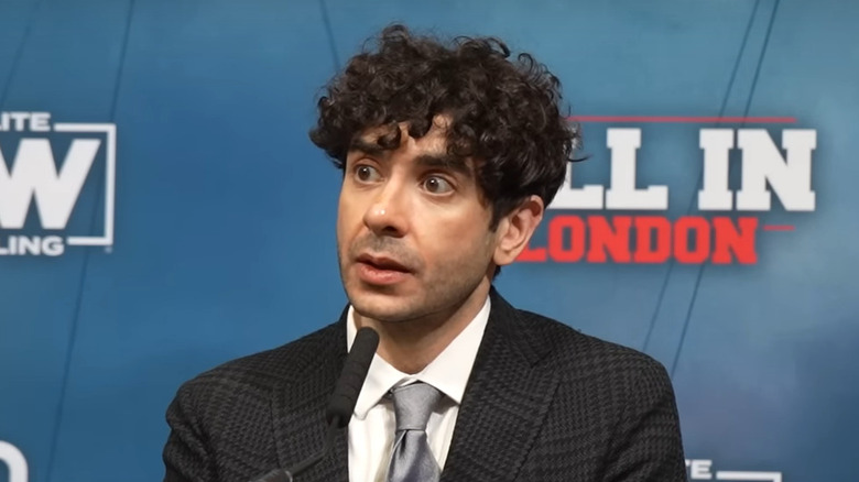 Tony Khan speaking at the All In London post-show scrum