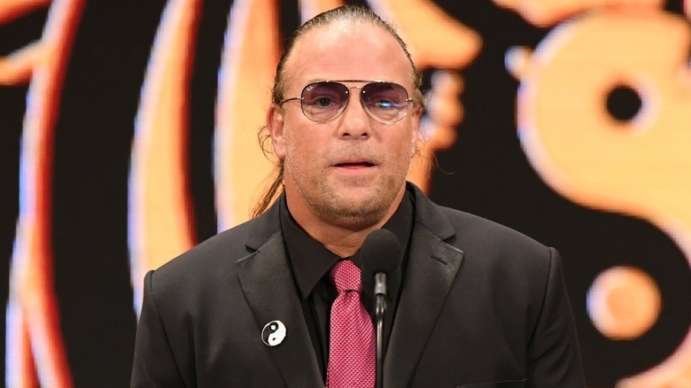 Rob Van Dam wearing a suit at WWE Hall of Fame induction ceremony