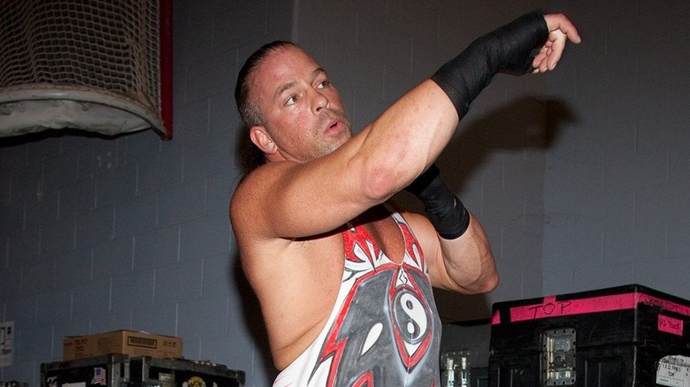 Rob Van Dam stretching backstage