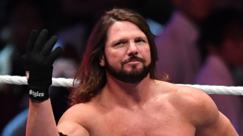 AJ Styles raises hand