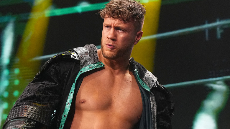 Will Ospreay wearing green and black jacket