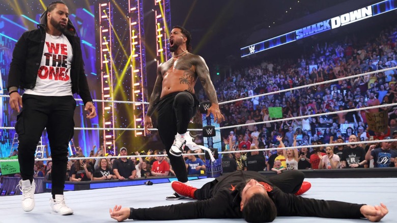 The Usos standing tall over Roman Reigns on WWE SmackDown