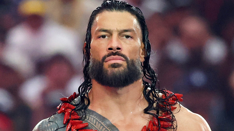 Roman Reigns wearing an Ula Fala