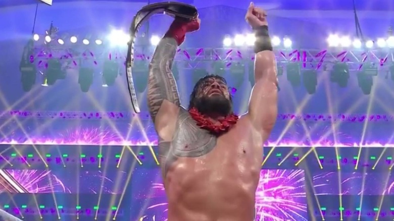 Roman Reigns celebrates at WWE Crown Jewel