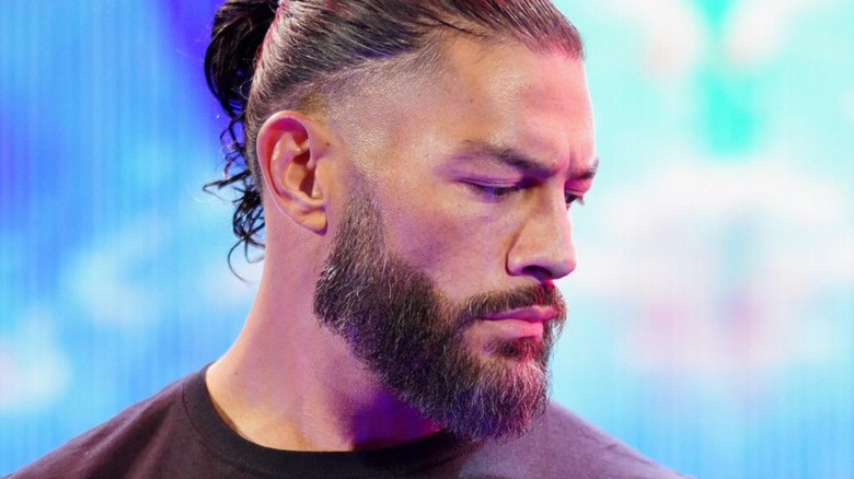 Roman Reigns looking down