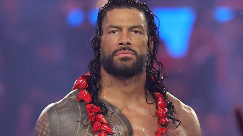 Roman Reigns wearing the Ula Fala around his neck