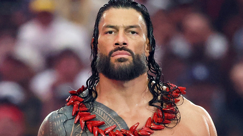 Roman Reigns wearing an Ula Fala
